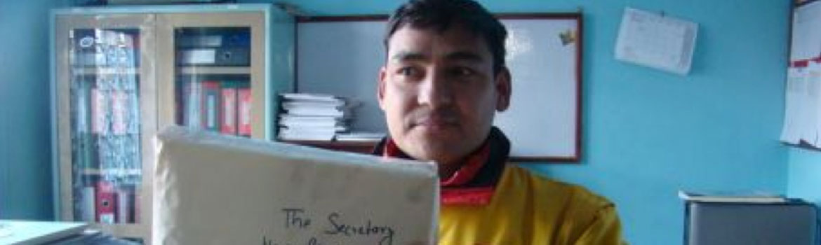 Courier collecting communication to the Human Rights Committee (c) Advocacy Forum